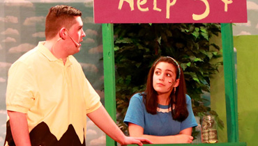Students acting in Charlie Brown Production 2018