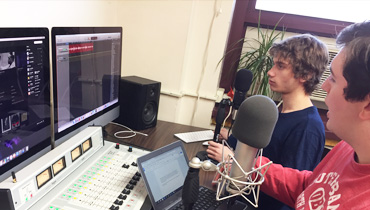 Students broadcasting radio program